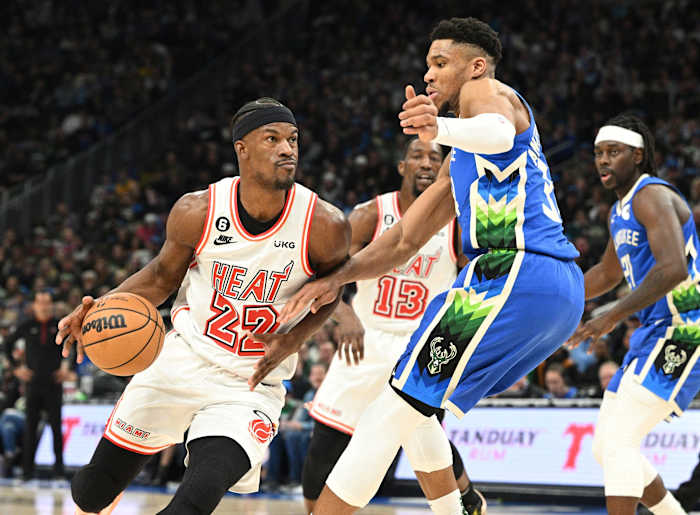 Miami heat forward Jimmy Butler tries to score against Milwaukee Bucks forward Giannis Antetokounmpo